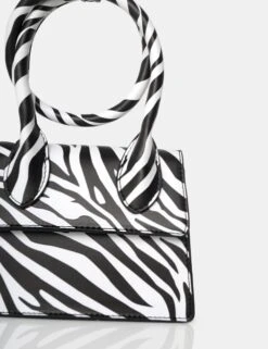 The Milan Zebra Print Monochrome Pu Crossbody Mini Bag 7 The Milan Zebra Print Monochrome Pu Crossbody Mini Bag -LoafLuxe Shop 2 c6e8c5e0 990b 4a99 bfe3 58892419d558