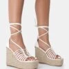 Reece Wide Fit Ecru Pu Knot Strap Lace Up Raffia Wedge Heels 1 Reece Wide Fit Ecru Pu Knot Strap Lace Up Raffia Wedge Heels -LoafLuxe Shop 771A3453 d488a30c 5e67 420b a6c3 c2ba662d2e09